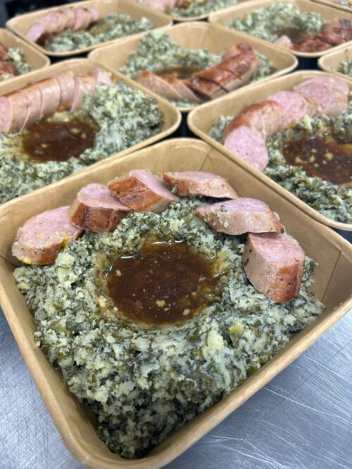 Boerenkool stamppot met jus en een saucijsje